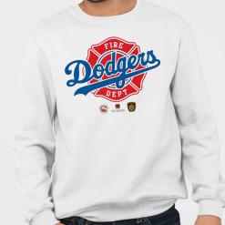 A man wearing a white sweatshirt with the Los Angeles Dodgers logo on it.