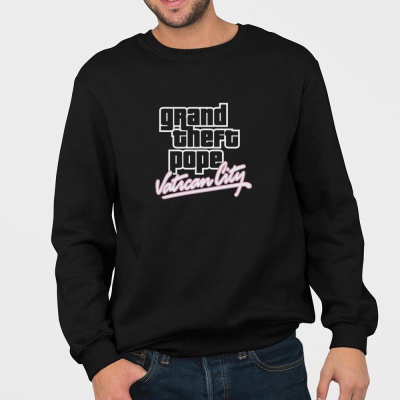 A man wearing a black sweatshirt that says grand theft auto v.