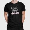 A man wearing a black shirt that says Grand Theft Pope Vatican city.