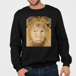 A man wearing a black sweatshirt with a picture of a lion.