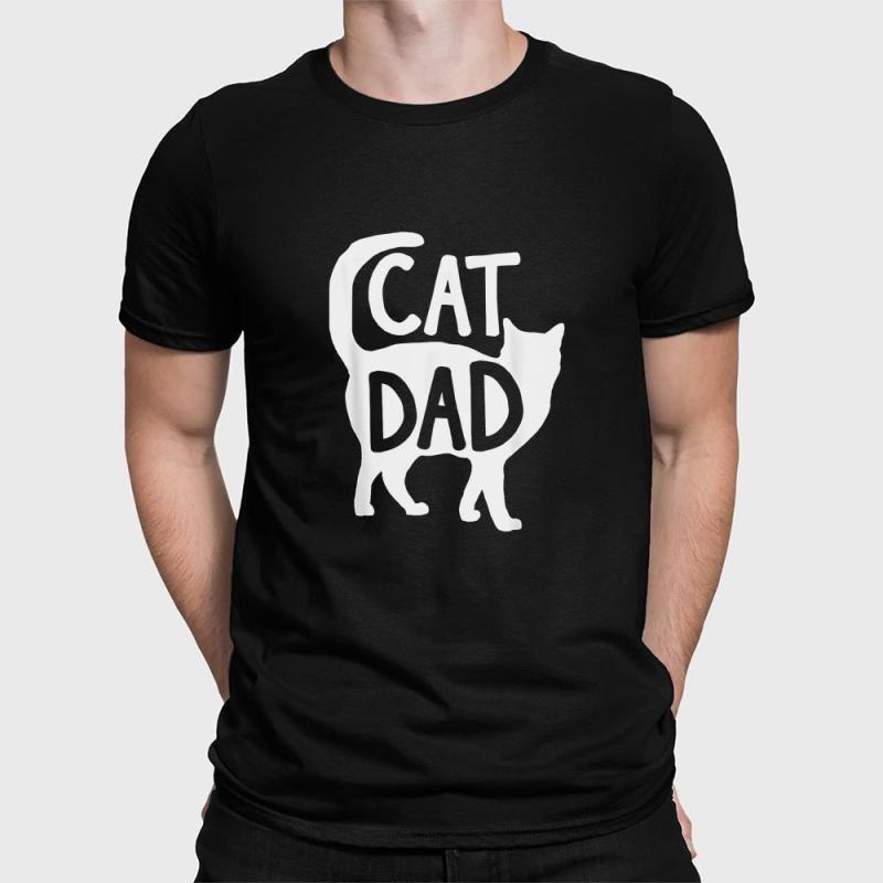 A man wearing a black shirt that says cat dad