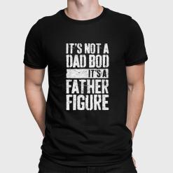 A man wearing a black shirt that says it's not a dad bod, it's a father figure.