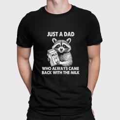 A man wearing a black shirt that says just a dad who always came back with the milk.