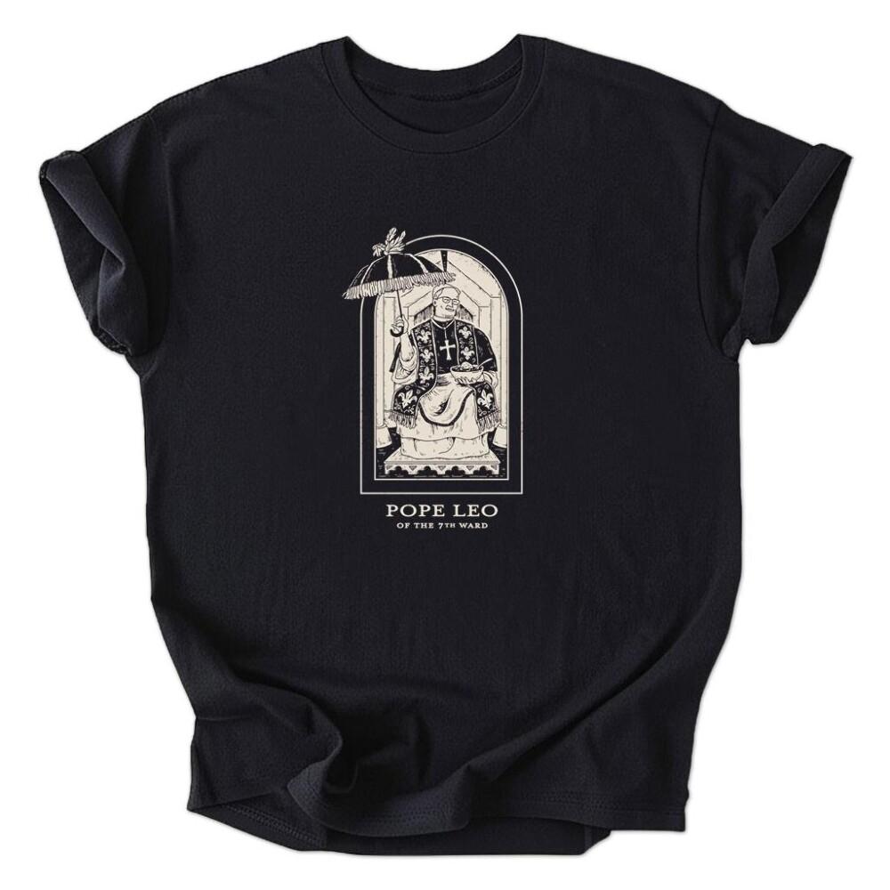 A black shirt with a picture of pope leo on it.