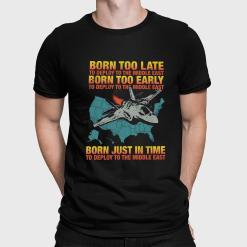 a man wearing a black shirt that says born too late to deploy to the middle east