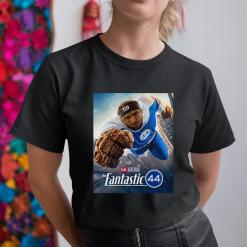 A woman wearing a black shirt with a picture of a football player.