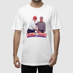 A man wearing a white shirt with a picture of two men shaking hands.