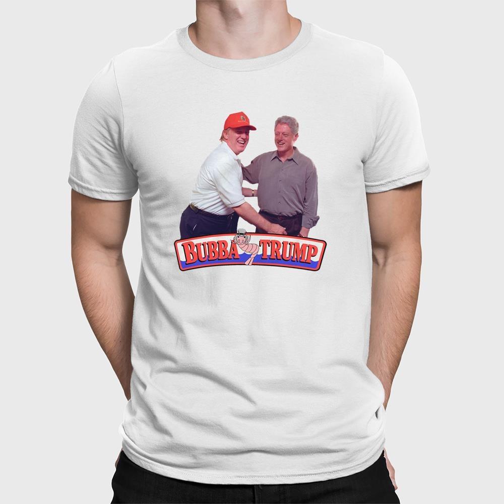 A man wearing a white t-shirt with a picture of trump and bill clinton shaking hands.