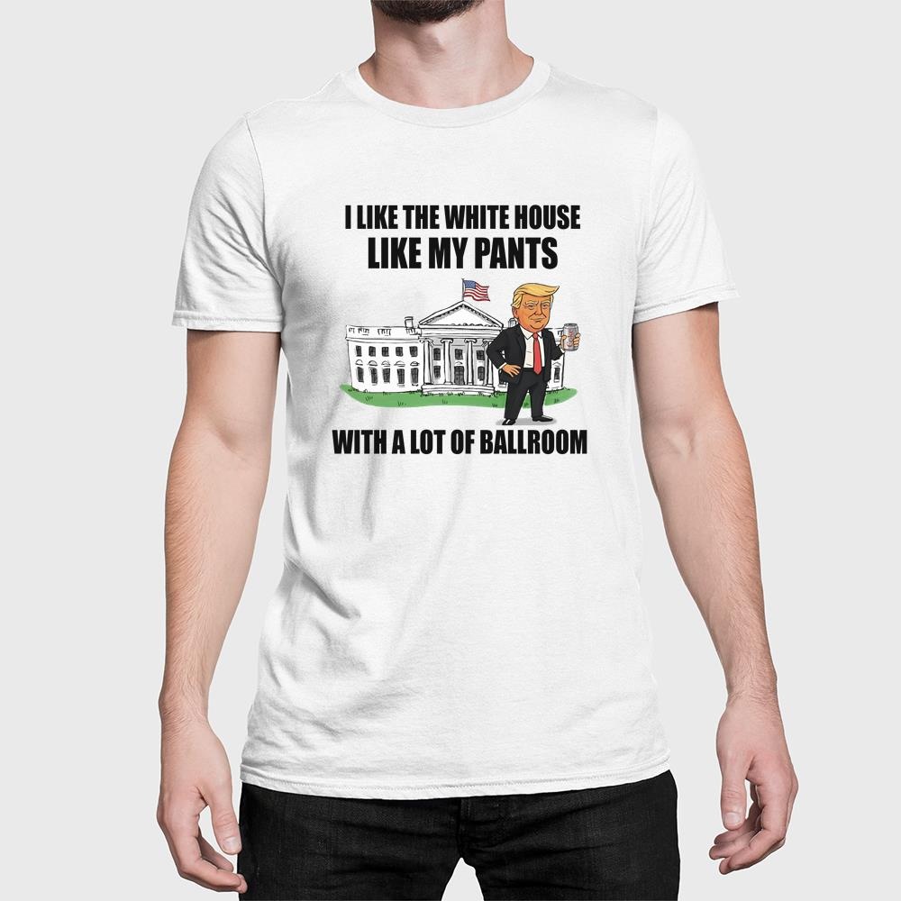 A man wearing a white shirt that says i like the white house like my pants with a lot of ballroom
