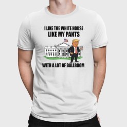 A white t-shirt with cartoon of Donald Trump standing in front of the White House on it