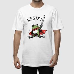 A man wearing a white shirt with a frog holding a sword.