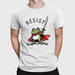 A man wearing a white shirt with a frog holding a sword.