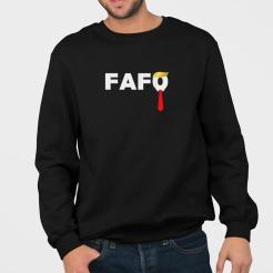A man wearing a black sweatshirt with the word fafo on it.
