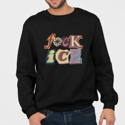 A man wearing a black sweatshirt that says f*ck ice.