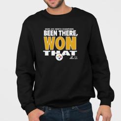A man wearing a black sweatshirt that says been there, won that.